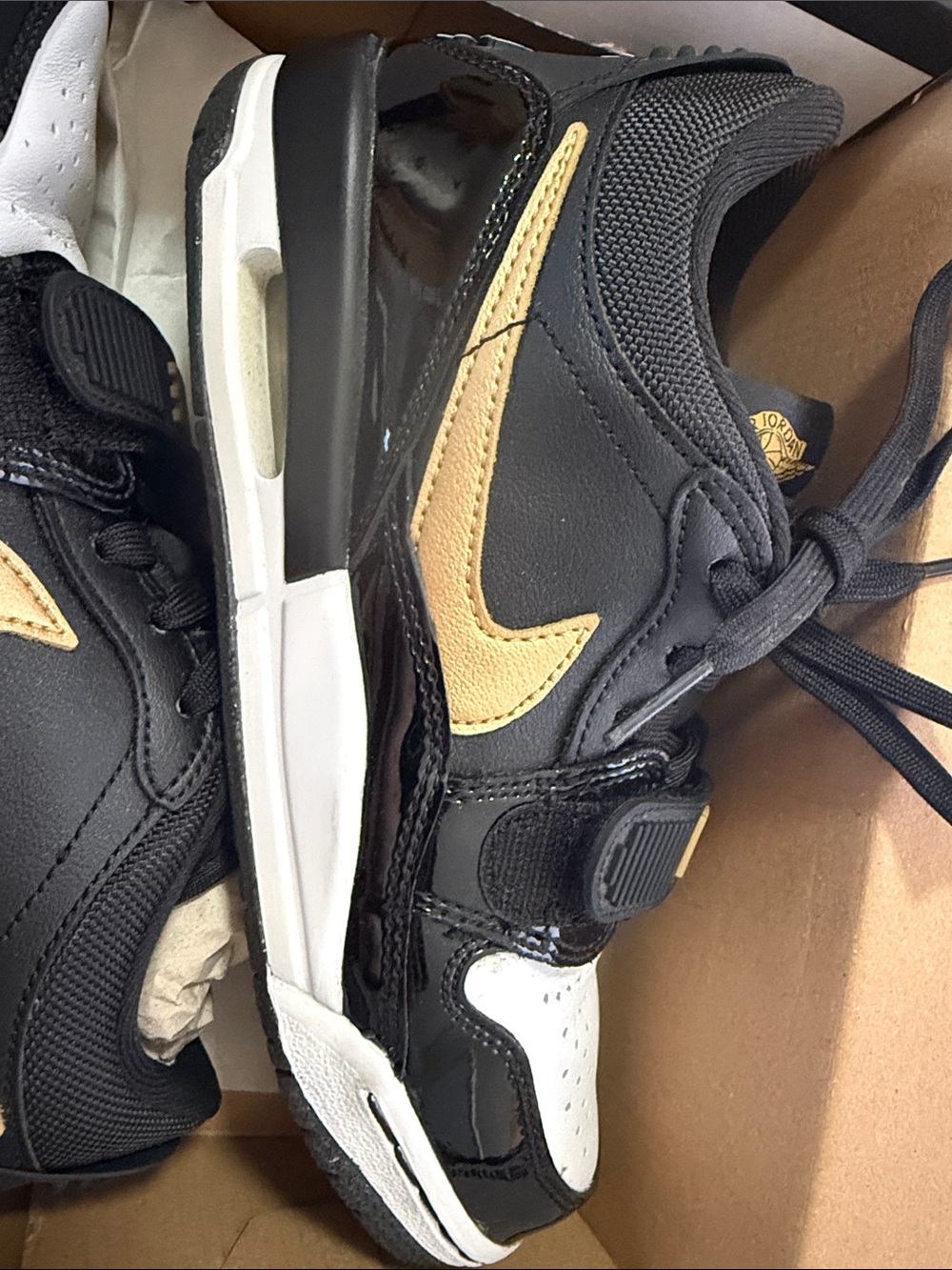 Jordan Kids Black and Gold Low-Top Sneakers with White Accents